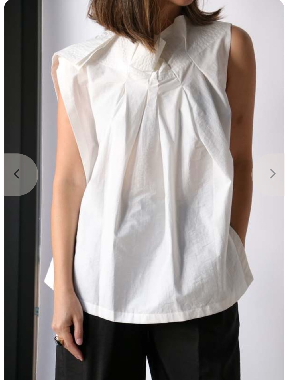 Designer Christian Wijnamts Sleeveless White Pleated Cotton Blouse
